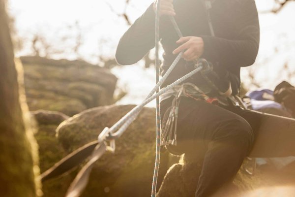 How often should the seat belts be tested for wear and tear in a vehicle used for commercial purposes?